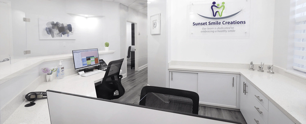 Reception desk at the Sunset Smile Creations Kendall office.